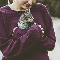 Woman Holding Kitten