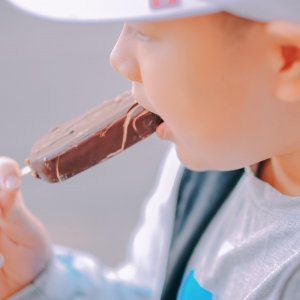 Child Eating an Ice Cream Bar