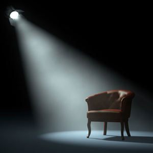 empty chair with spotlight shining