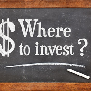 Chalkboard with "$ Where to invest?" written in white chalk