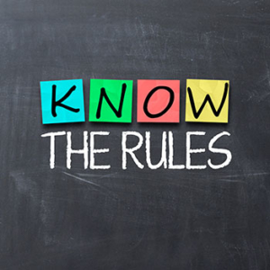 Chalkboard background with each letter of "know" written on blue, green, red, and yellow posit notes respectively and "THE RULES" written in chalk below 